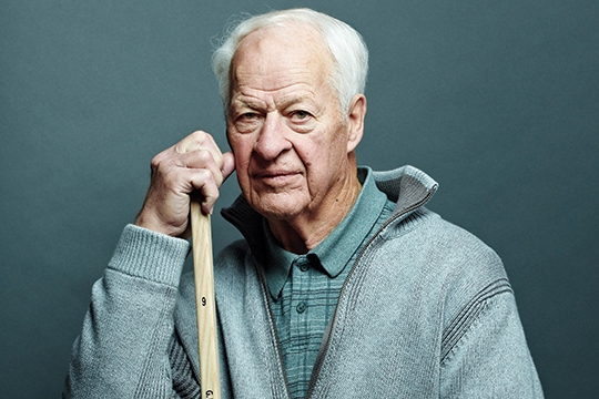 Gordie Howe (Mr. Hockey) holding Northland Pro hockey Stick.