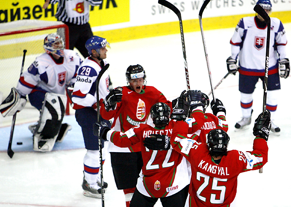 Hungary's Holeczy celebrates his goal against Slovakia with teammates during their IIHF World Hockey Championship game in Zurich