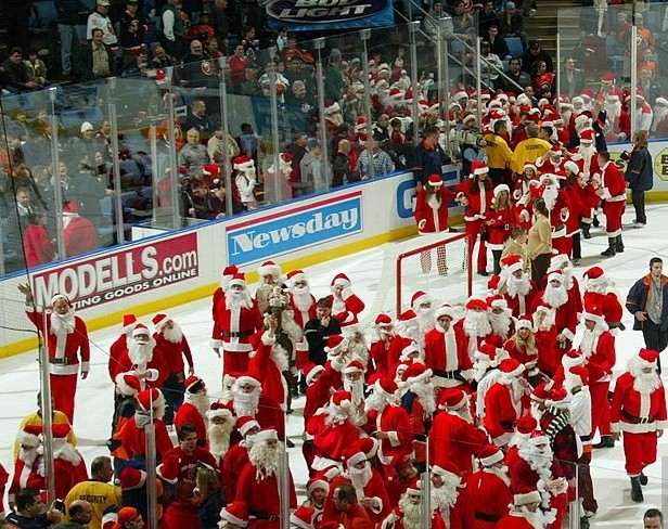 New York Islanders fans dressed as Santa Clause